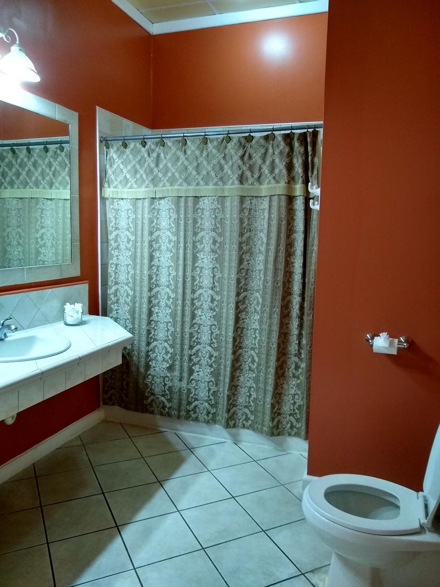 Deluxe Colonial King Room with Living Space (Lobby Entrance)